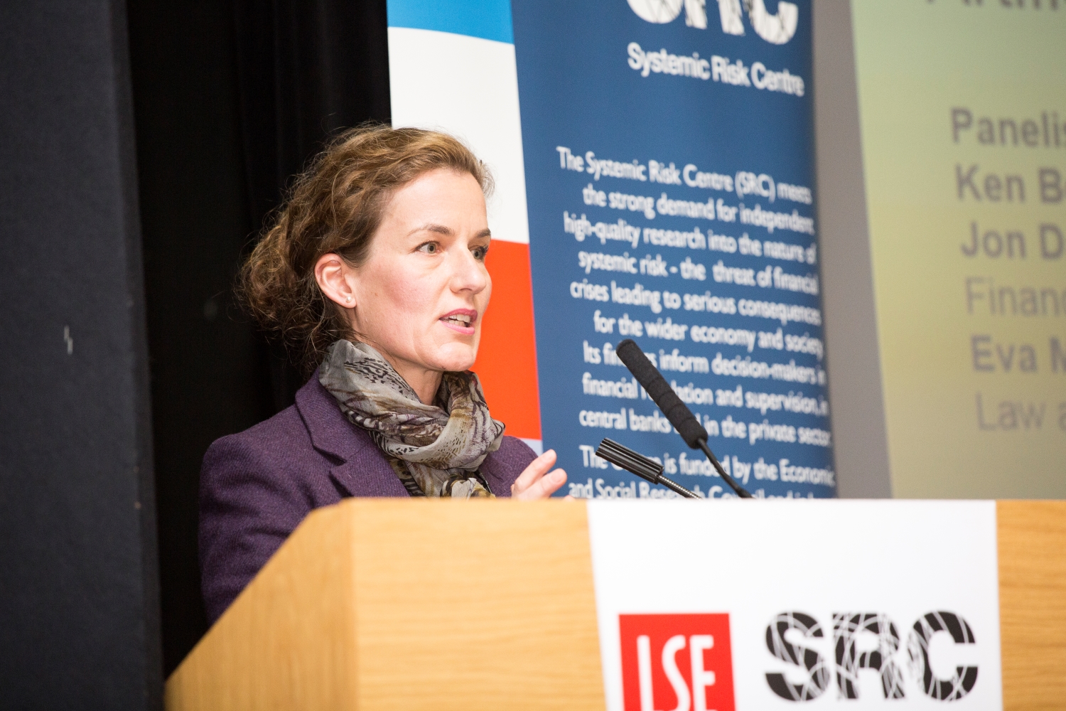 Eva Micheler speaking from lectern at SRC event on AI and systemic risk
