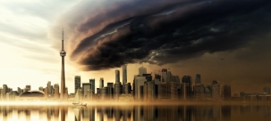 Image of tornado approaching a horizon of skyscrapers